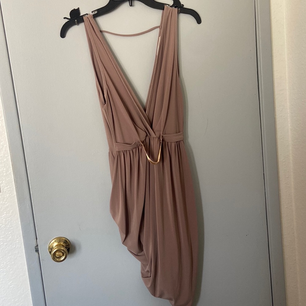 Party dress, a little backless, gives curve